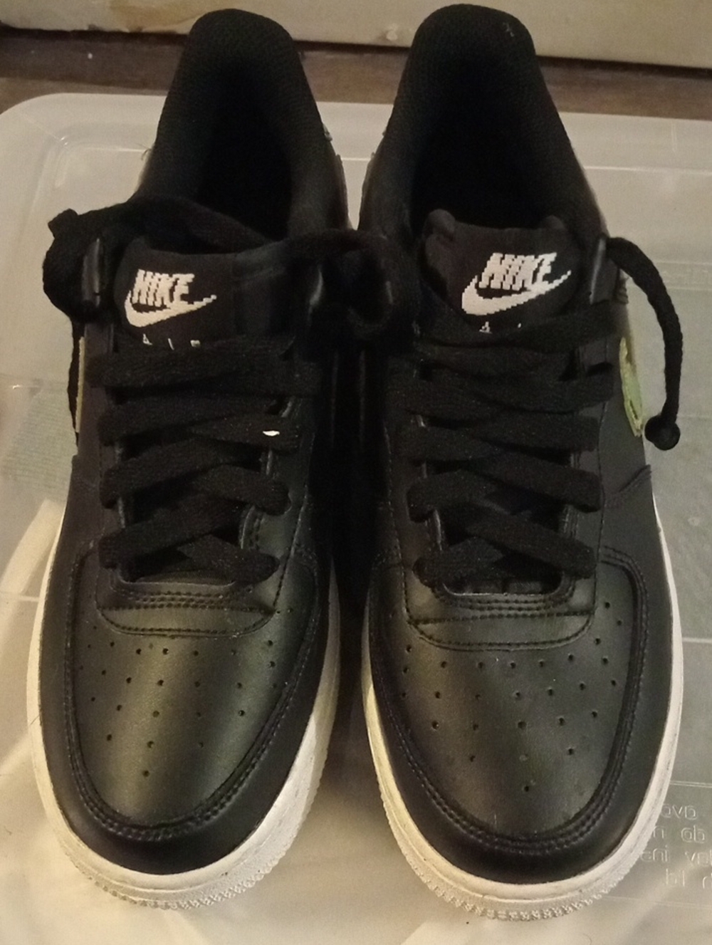Nike Air Force 1 Black Low-Top Sneakers with White Soles